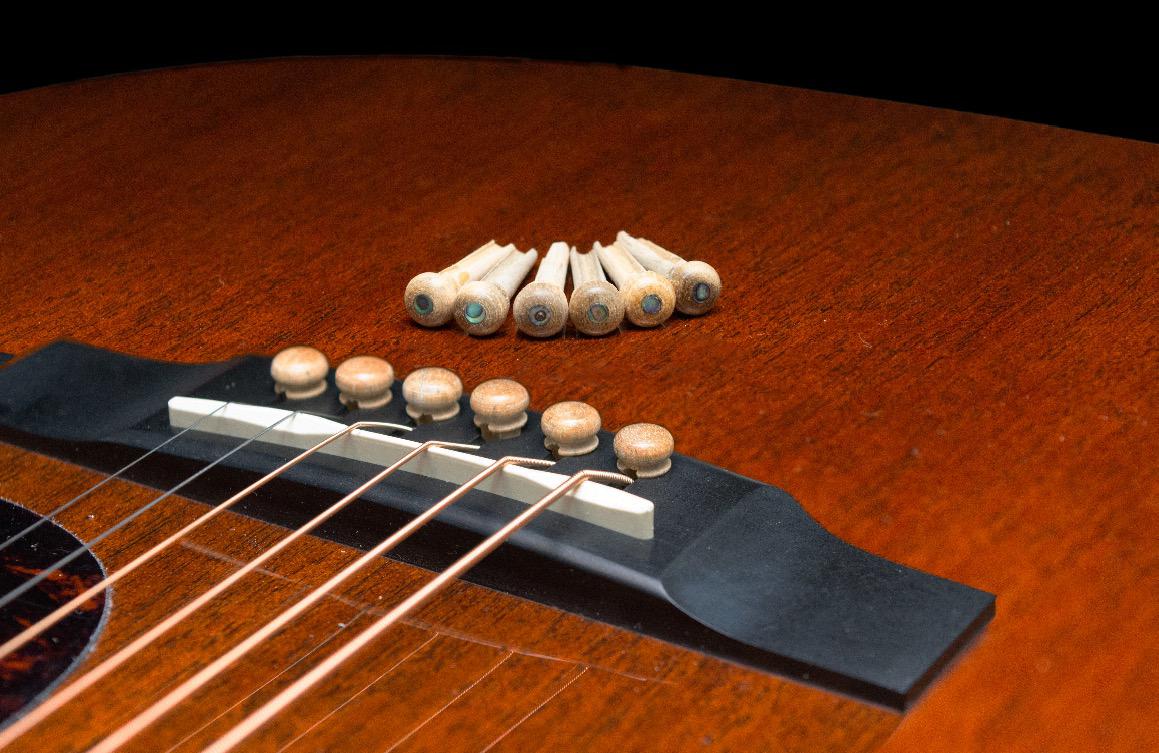 Black FineGood 24 pcs Guitar Bridge Pins with 2 pcs Bridge Saddle and Nut Ivory Plastic Acoustic Bridge Pins and 6 String Real Bone Folk Bridge Saddle Guitar Replacement