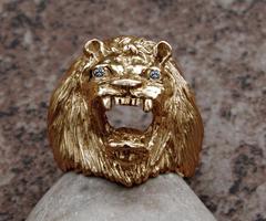 large 14K gold lion king ring with diamonds